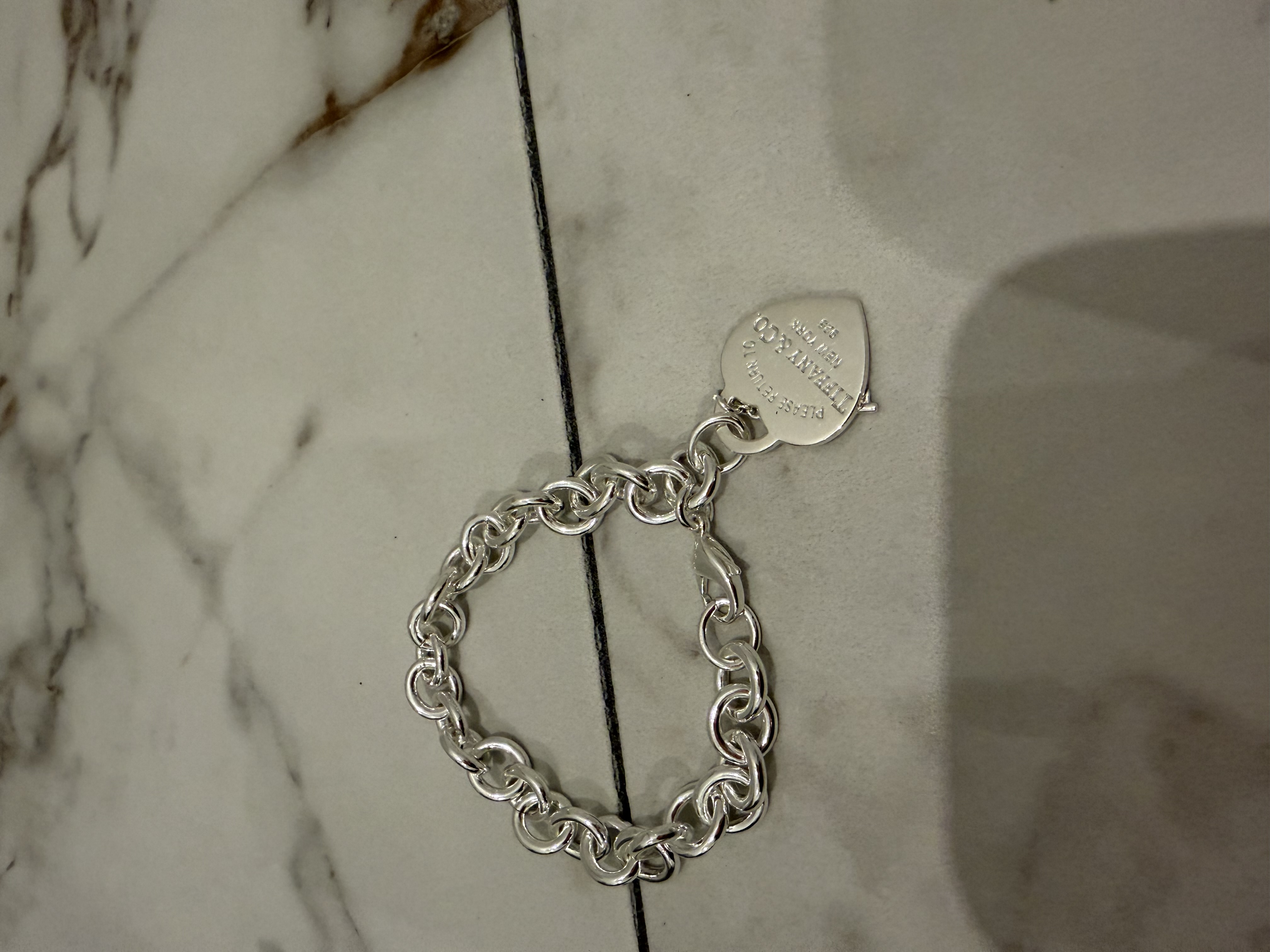 Tiffany & Co. Return to Tiffany Love Heart Tag Key Bracelet authentication record photograph